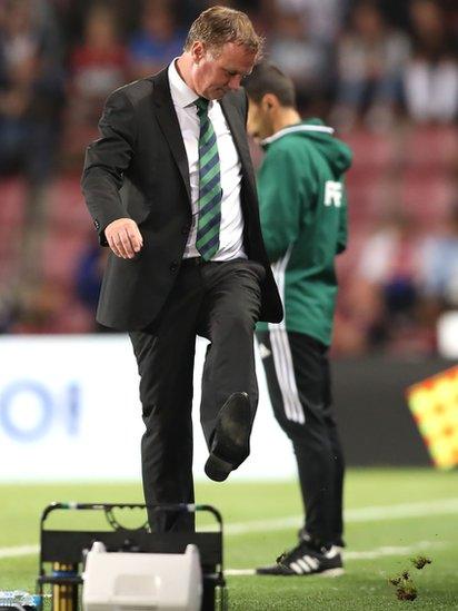 Northern Ireland manager Michael O'Neill kicks the ground in frustration during the 0-0 draw in Prague