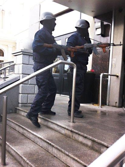 Two gunmen wearing police-style uniforms enter Dublin's Regency Hotel