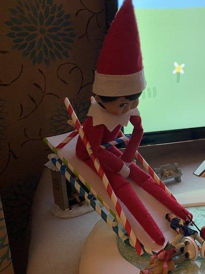 elf-on-a-sleigh.