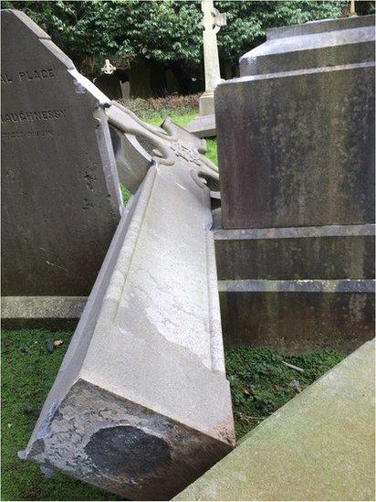 Broken headstone