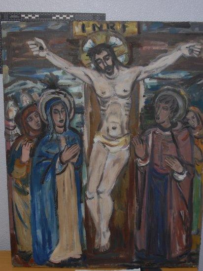 One of the paintings depicting Jesus Christ on a cross