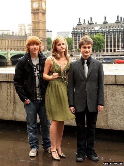Rupert Grint, Emma Watson and Daniel Radcliffe pose at the photocall for Harry Potter And The Order Of The Phoenix on June 25, 2007 in London, England