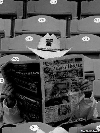 Man reading newspaper