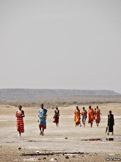 A group of women crossing the salt lake in Magadi