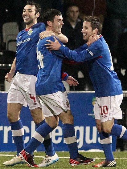 Linfield players celebrate taking the lead in the 27th minute through a superb strike by Brian McCaul