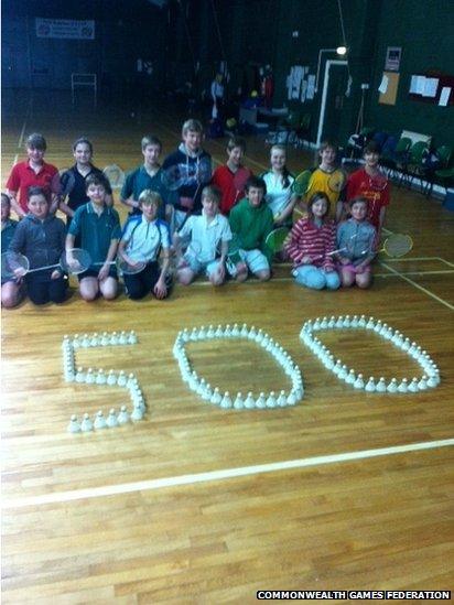 Youngsters in Guernsey mark the 500-day milestone with shuttlecocks at a badminton lesson