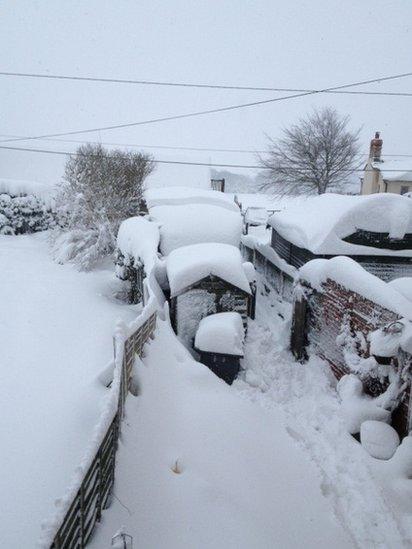 Snow-covered buildings. Photo: Linda Cartledge