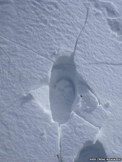 A footprint in snow at Creag Meagaidh