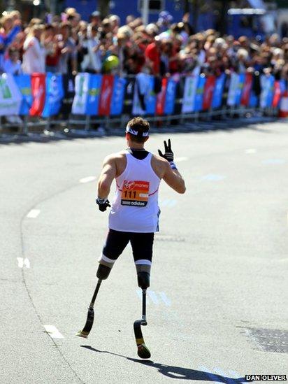 British Paralympic athlete Richard Whitehead waves. Photo: Dan Oliver