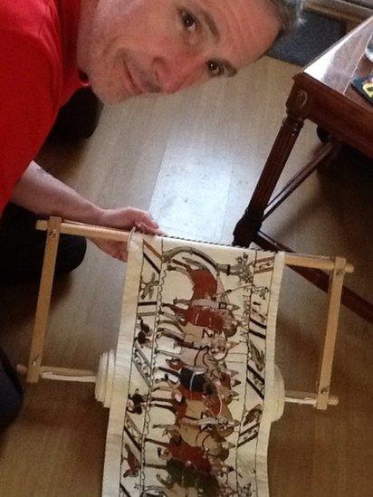 Andy Wilkinson with his tapestry