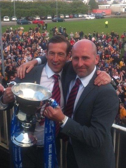 Newport County manager Justin Edinburgh and assistant manager Jimmy Dack with the play-off cup