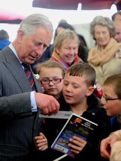 Prince Charles talks to local schoolchildren at the Hay Festival