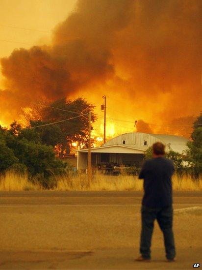 Man watches fire burn in Yarnell (30 June 2013)