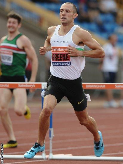 Dai Greene wins his heat at the British Championships and World Championships trials in Birmingham