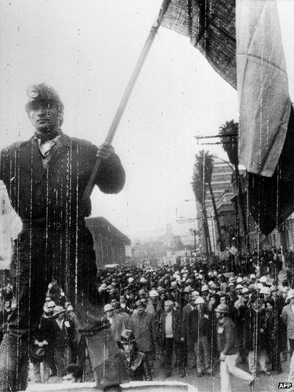 Copper mine workers demonstrate in the streets of Santiago