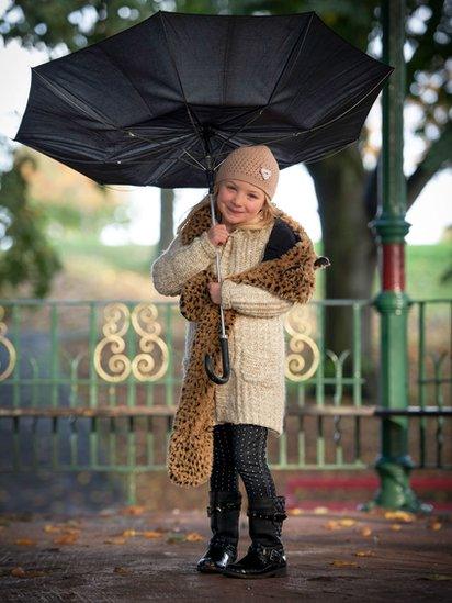 Still stormy weather, Craig MacDougall from Wrexham sent in this photo of his daughter fighting off the rain and the wind