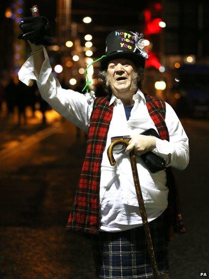 Man celebrates the start of the new year in Edinburgh