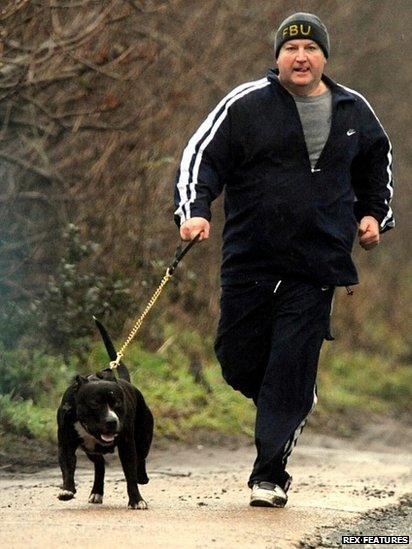 Bob Crow, leader of the RMT Union out for a morning jog with his dog Castro, 2010