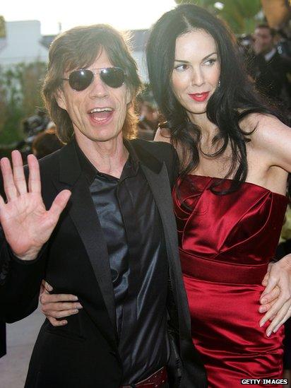 Mick Jagger and L'Wren Scott arrive at the Vanity Fair Oscar Party in 2006