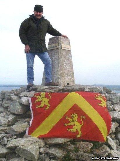 Andy Strangeway and a flag