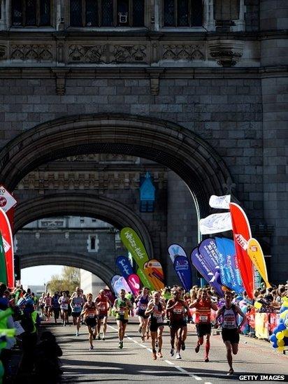 Runners make their way over Tower Bridge