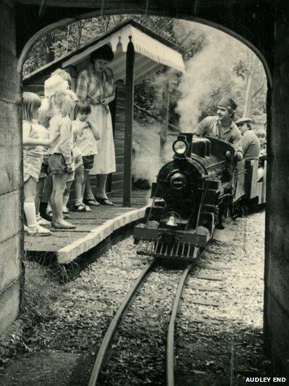 Steam train going into tunnel