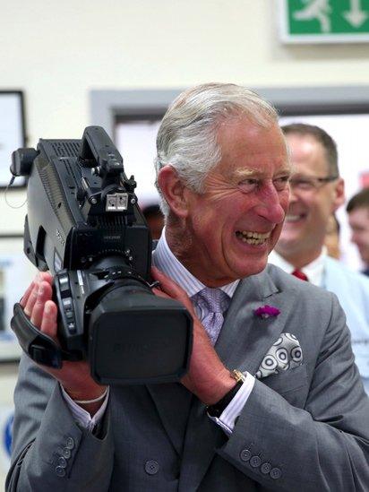 Prince Charles with video camera