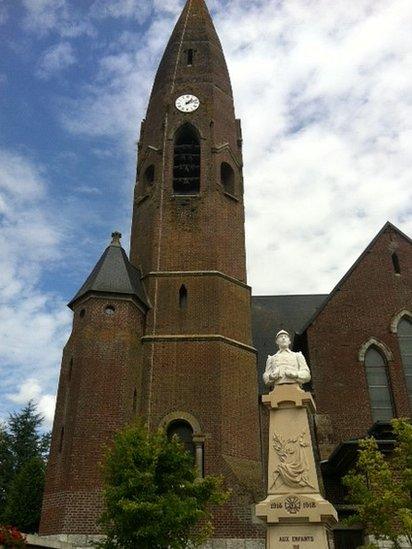 Rebuilt church at Bouzincourt shaped like an artillery shell. 5 Aug 2014