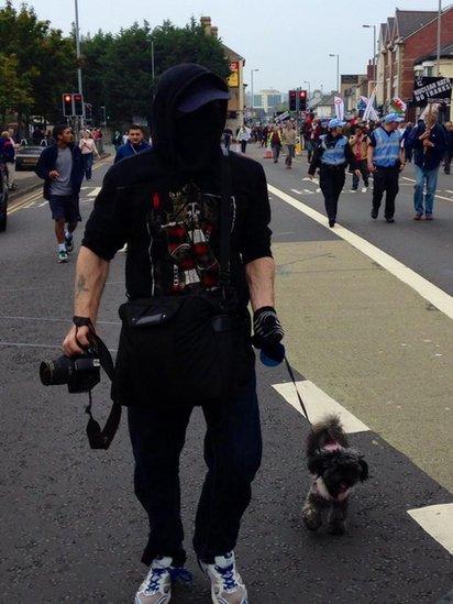 Man and dog protest