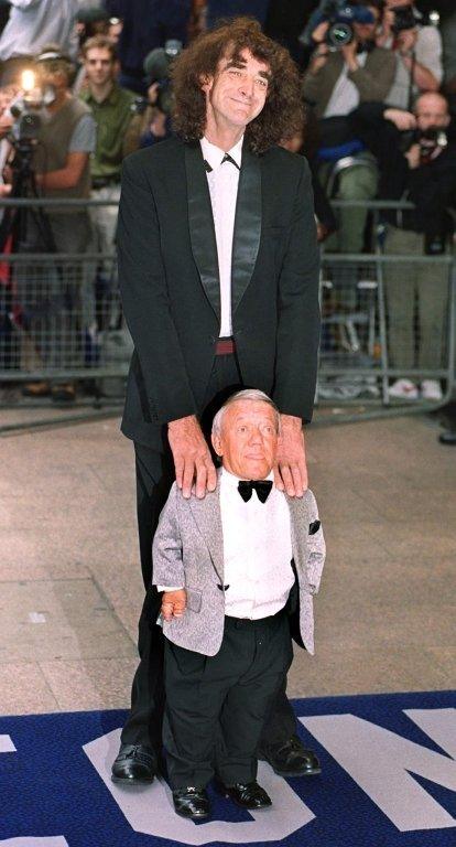 Actor Peter Mayhew (top), who played Chewbacca the Wookie in the first three Star Wars films with Kenny Baker