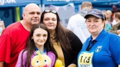 Tony Sheil with daughters Natasha, Samantha-Jane, and partner Michaela