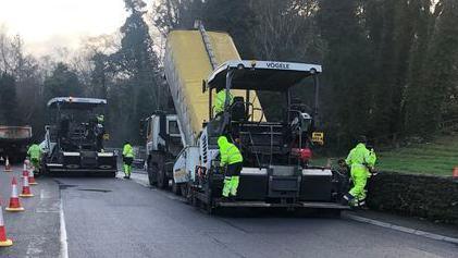 DOI workers carrying out resurfacing works