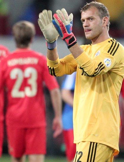 Roy Carroll applauds the travelling Northern Ireland fans after the 2-0 defeat by Russia in a World Cup qualifier in September