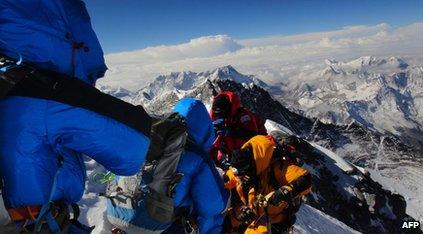 Climbers on the summit of Mount Everest