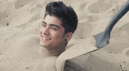 Zain from One Direction on the beach for the group's What Makes You Beautiful video