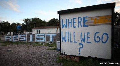 Graffiti saying "where will we go?" and "resist"