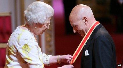 The Queen awards a knighthood