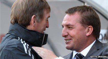 Kenny Dalglish chatting with Brendan Rodgers