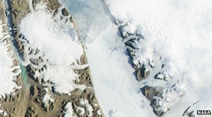 Petermann Glacier - image 1 of 3 showing an iceberg breaking away