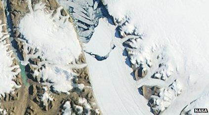 Petermann Glacier - image 3 of 3 showing an iceberg breaking away