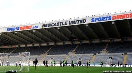 stand at Newcastle United's ground with the logo 'sports direct.com'