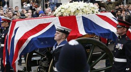 Lady Thatcher's coffin is carried through London's streets