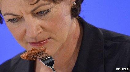Hanni Rutzler, a food researcher from Austria, tastes the world"s first lab-grown beef burger