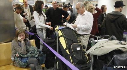 Passengers waiting at Heathrow airport