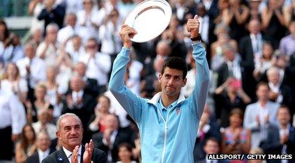 Novak Djokovic lifts his runners-up plate