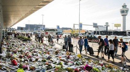 Thousands of flowers have been laid at Schiphol Airport, Amsterdam