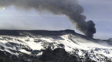 a plume of ash rises from the volcano in southern Iceland's Eyjafjallajokull glacier, Iceland, Tuesday, April 20, 2010