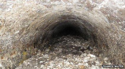 A huge water pipe bunged up- and almost totally blocked by tonnes of old and congealed fat.