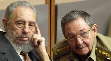 Fidel Castro, left, and his brother, Raul Castro in 2004