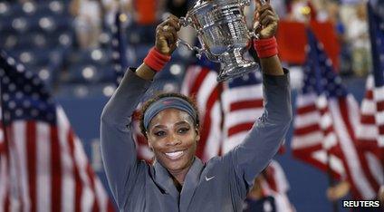 Serena Williams lifts the U.S Open Trophy